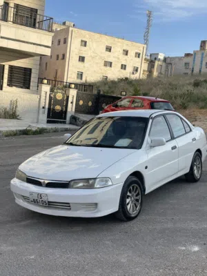 متسبوشي لانسر موديل 98 بحالة الشركة وممشى قليل جدا