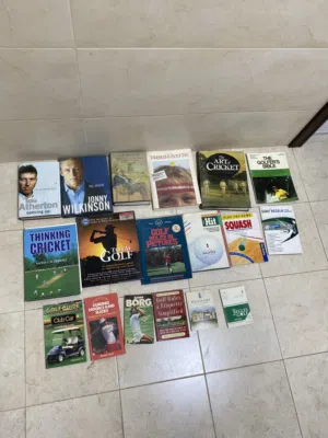 Sports books, mostly about golf