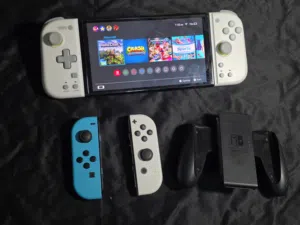 Jailbroken and hacked Nintendo switch OLED with 128 GB SD card containing 30+ games