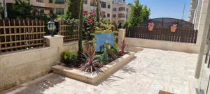 شقة أرضية فاخرة للبيع في خلدا - خلف السيفوي 220م مع حديقة وترسات 400م تشطيب سوبر ديلوكس