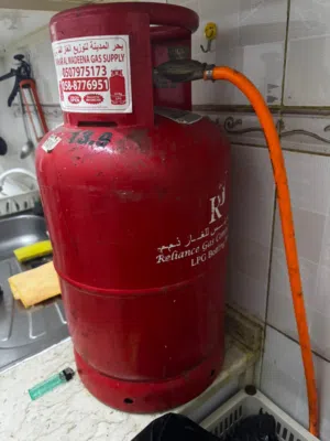 gas cylinder with gas regulator and hose full gas small