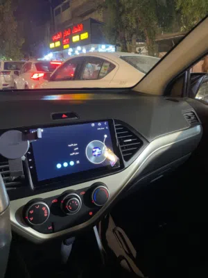 سياره كيا بيكانتو موديل 16 وارد خليجي نظيف جدا ماشيه 65 اللون ابيض وفيها شاشه كبيره
