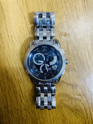 Citizen . Analog Quartz . Bronze3