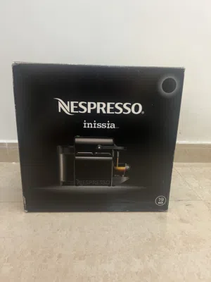 Brand new black Nespresso inissia coffee maker