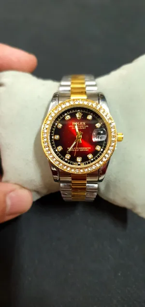 Rolex . Analog Quartz . Red4