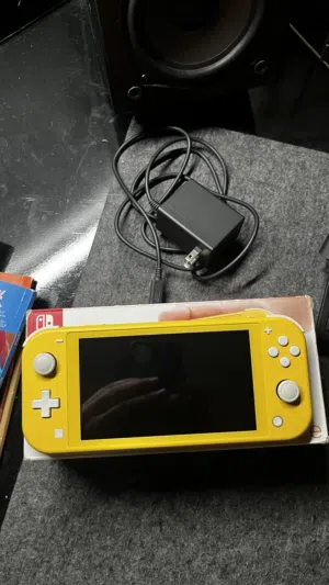 نيتندو سويتش لايت مستعمل يومين مع 128gb شاهد الوصف ضروري :::::::::::::::::::::::::::::::::::::::::::