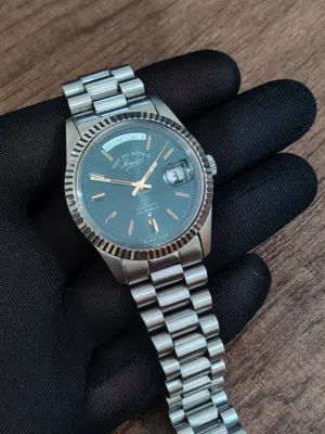 West End Watch Co.Sowar Prima. Automatic + crown movt. Green Sunburst dial. Ref no. 6828.10.