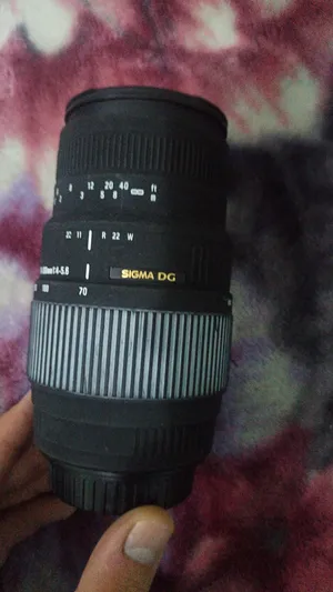 عدسة كانون Canon lens sigma DG micro 70-300mm f5.6