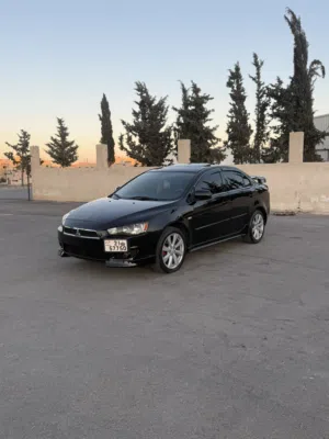 ميتسوبيشي لانسر موديل 2010 فل كامل فحص كامل بحاله الشركه