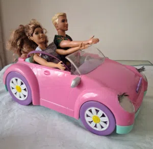 5 barbies + 3 Ken + Barbie car + motorbike