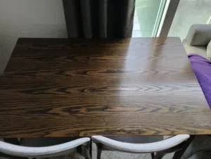 4-seater wooden dining table