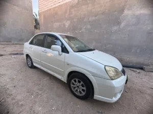 سازوكي ليانا رقم بصرة بأسمي رقم جديد  حدادة +بطارية جديد كهربائية كلة شغالة  محرك جديد توني شادة مكف