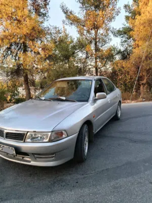 سياره متسوبيشي لانسر موديل 1996