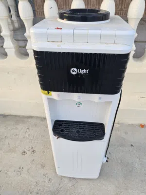 ثلاجه مياه مستخدمه ( خربان فيها السخان فقط )