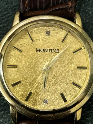 ساعه مونتا رش ذهب عيار 24 مع فصين الماس صغار Montine 24K Gold Leaf dial with 2 Diamonds Wristwatch