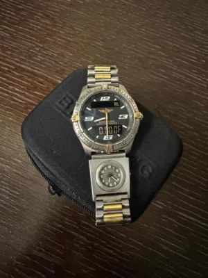 ( Breitling Aerospace + UTC )   مع علبتها