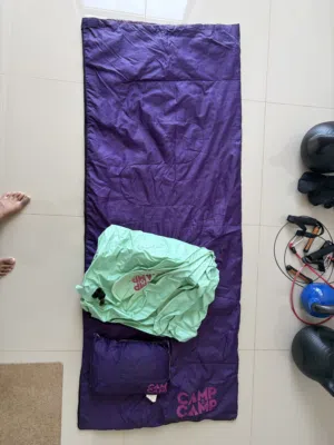 Camping mattress and sleeping bag from Tomorrowland. And Another mattress