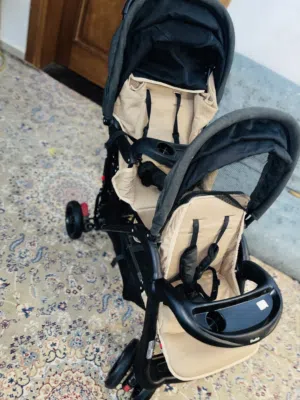عربة توأم من ماركة Dochi