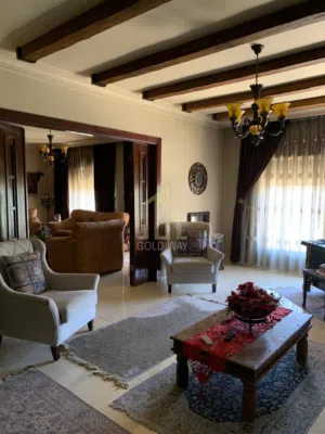 بالقرب من السفارة البريطانية شقة ارضية 290م مفروشة في أجمل مناطق عبدون / ref 1070
