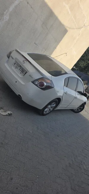 نيسان التيما 2009    مطلوب 7000 كاش حصرا سبب لبيع لسفر