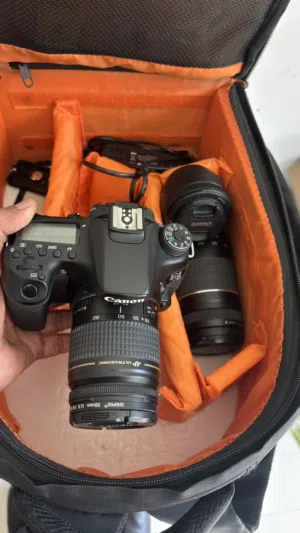 Canon eos70d with 50mm 1.8, 75-300 mm and 28-80 mm