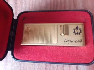 شعار نفط ليبيا على ولاعة ألماني مطلية بالذهب شيك جدااا