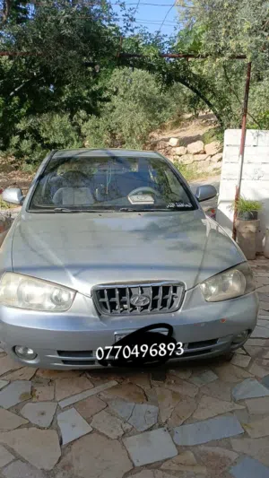 سيارة هيونداي أفانتي 2001 كوبيه فضية بحالة مستعملة معها ترخيص طويل قطارة بنزين ماتور 15