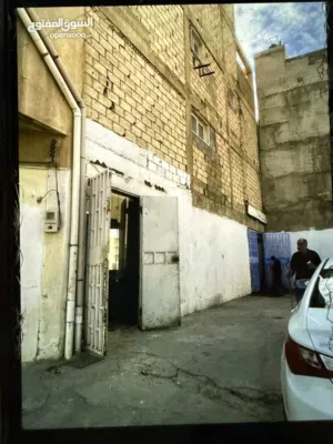 بيع ارض  سكنيه او تجاريه مع مستودع بشهادة عقارية في راس عبيدة