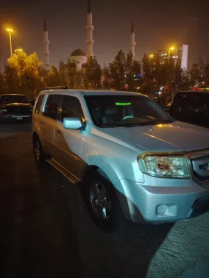 هوندا بايلوت 2009 صبغ وكالة ما عدا الدعميات الخلفية والامامية الممشى: 396,000 كم.