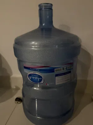 2 empty Al Bayan 5-gallon water gallons
