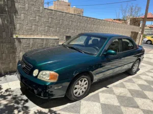 كيا اوبتيما2004