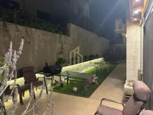 عقار مميز في أم أذينه شقة شبه أرضي 164م بتشطيبات راقية / ref 1194