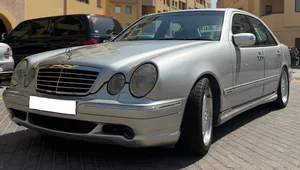 Unleash Power and Luxury: 2001 Mercedes-Benz E55 AMG a future classic for Sale!