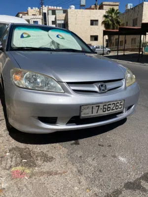هوندا سيڤيك exi موديل 2004 ، لون سلڤر بحالة جيدة ، وارد الوكالة بالاردن ، فحص 4 جيد