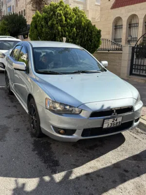 للبيع ميتسوبيشي لانسر 2014 GLS Plus مجمركة ومرخصة بمواصفات خليجية  لانسر فراشة  5 ركاب