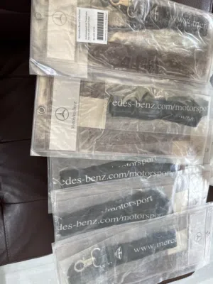 Mercedes OEM KEY FOB AND TICKET HOLDER  تعليقه مرسيدس للمفتاح الاصلية حامله تذاكر جديده غير مفتوحه