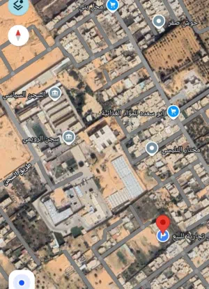 ارض عقارية لي كل شي ارض في عين زارة بالقرب من مول الدوبلوماسي مساحة ممتازة 594.76م او بنصف 289.8م x2