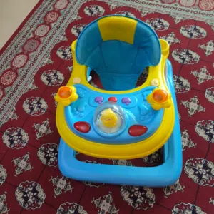 Juniors kids stroller and round walker good condition both 17bd