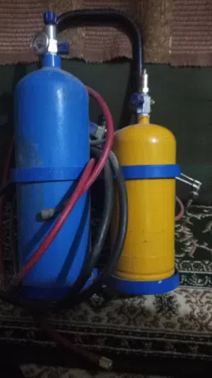 دبتين لحام اكسجين مع الراس وشنطة عدة للتكييف والتبريد