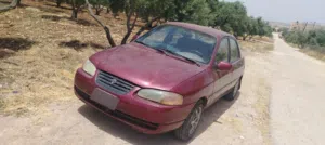 كيا افيلا 1999