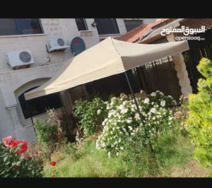 مظلات وحدائق خارجيه جميع الالوان والاحجام موجودين في ابو علندا والجلود جميع انواع الجلود والاقمشه