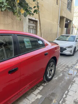 دوج جارجر2019 لون احمر طماطه  بيه ضربه باب الخلفي مبدل وكاله ماشيه 80 ميل  رقم بغداد با اسمي