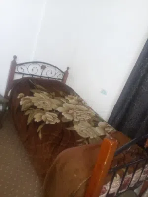 تختين مفرد حديد وخزانه