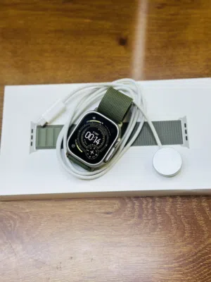 Apple Watch ultra 2 49MM Natural titanium condition used like new one month warranty with charger.