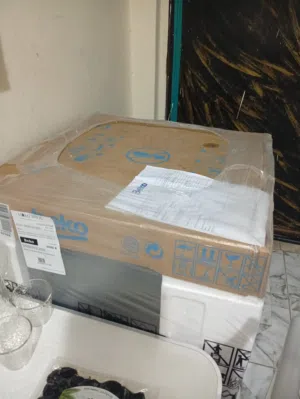 غسالة أطباق جديدة بالكرتونة لم تفتح بعد مع الضمان من الشركة