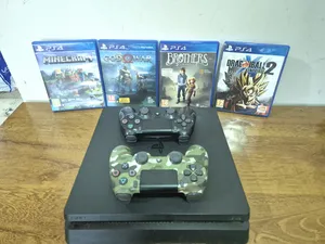 PS4 Slim 1 TB with 2 dualshock 4 controllers and 4 games