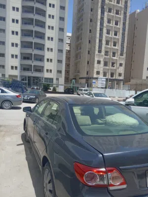 Used 2013 Toyota Corolla XLI Coupe with Electric Mirrors and Air Condition