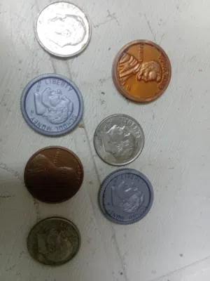 عملات امريكيه نادره 1سنت من البرونز عام 1977 تصل في المزادات الى 870الف دولار للبيع للجادين والمهتمي