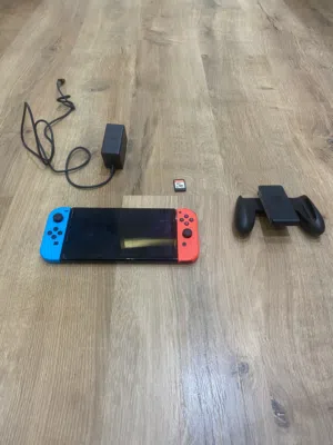 Nintendo switch oled (with game)