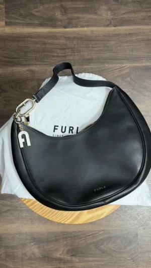 new furla crescent bag with charm